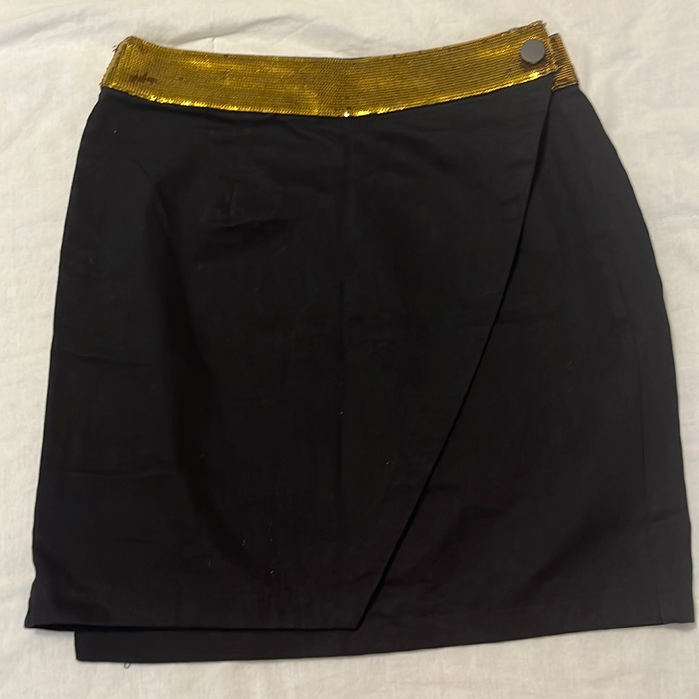 Small black and gold sequin miniskirt